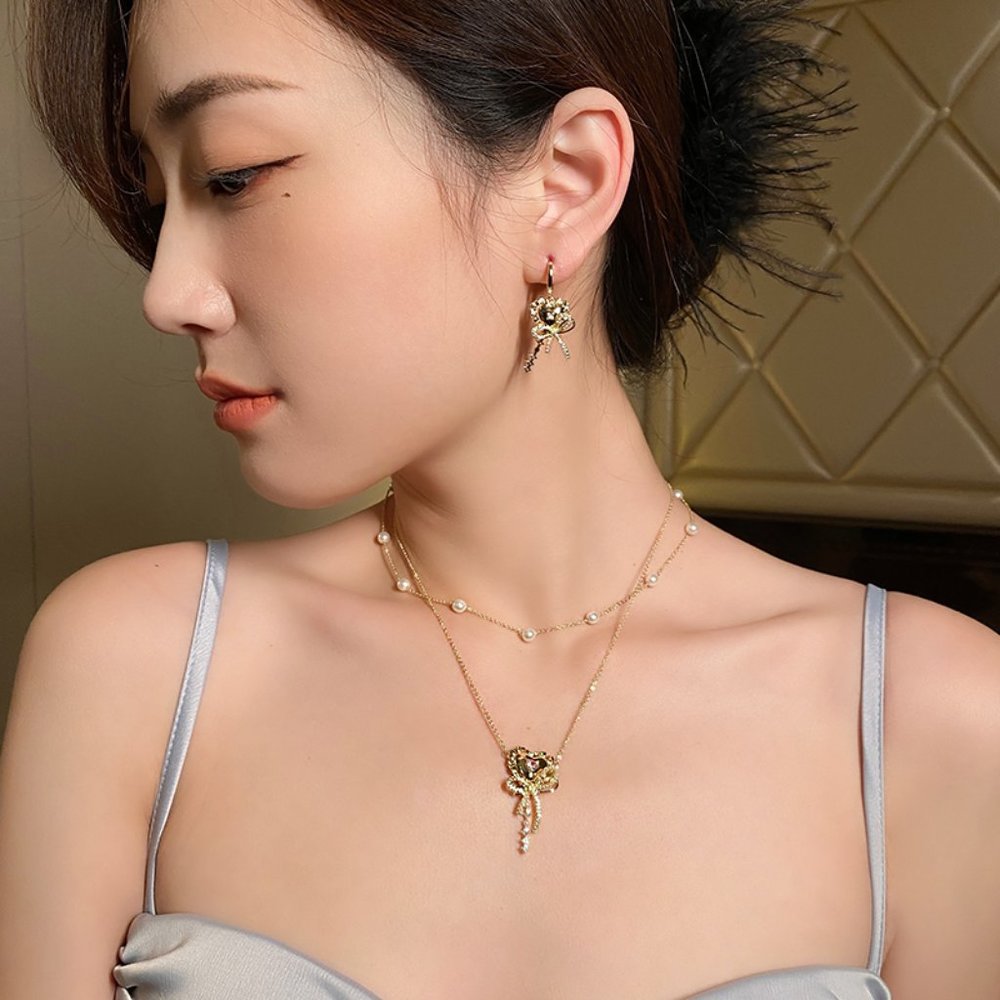 GOLICC Pearl Bow Necklace - Picture 8 of 8